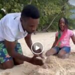 VIDEO: Best dad ever! Bobi Wine plays in sand like a baby VIDEO: Best dad ever! Bobi Wine plays in sand like a baby