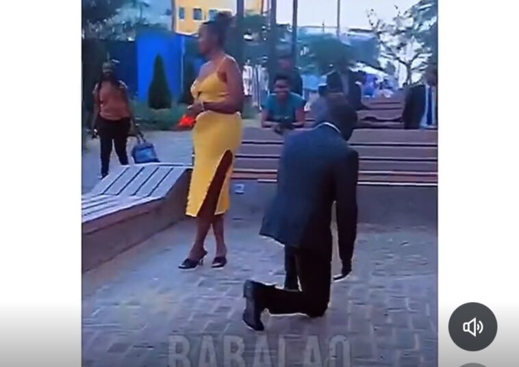 Video: Womam gives man shock of his life after he proposes to her in park Video: Womam gives man shock of his life after he proposes to her in park