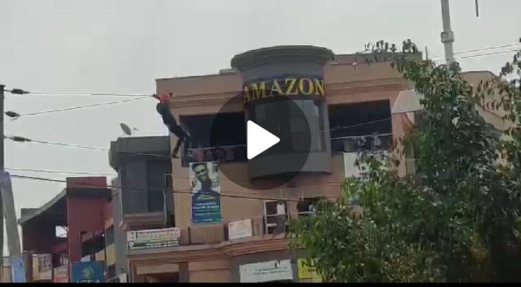 VIDEO: Shock! Man in Mbarara climbs on electric wires alongside streets VIDEO: Shock! Man in Mbarara climbs on electric wires alongside streets
